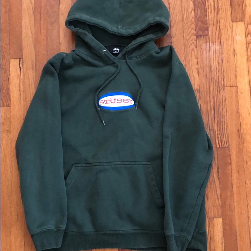 Stussy green sweatshirt with a hood